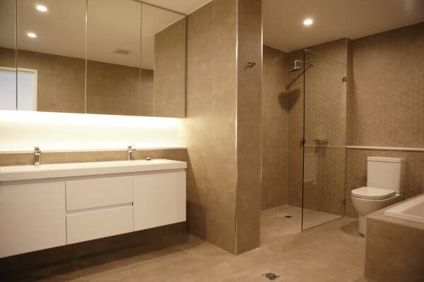 bathroom with tiles and white sink